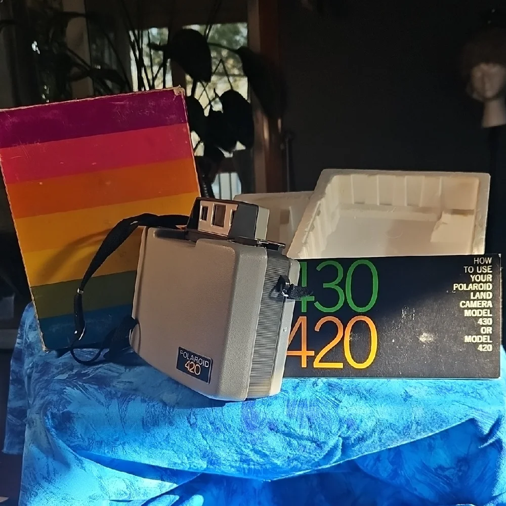 Polaroid Box with Navy Blue and Yellow Lettering
